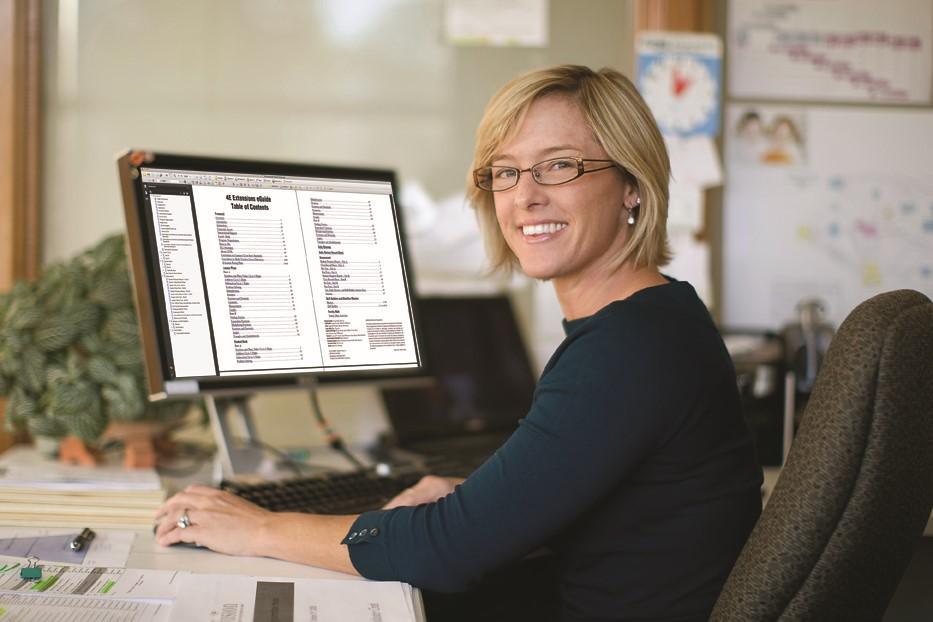 Teacher using online assessment suite tools